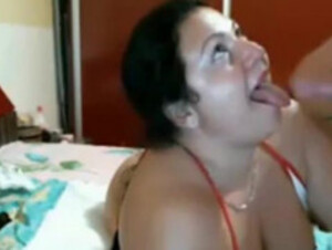 Chubby Latina takes load in mouth on webcam