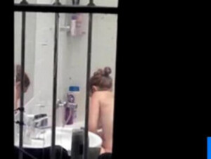 Neighbour caught naked in bathroom