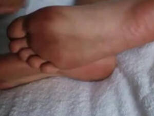 Huge load of cum over Mary's sexy feet soles!