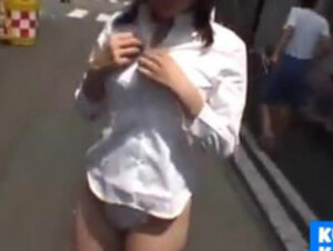Japanese girl strips naked in crowded area