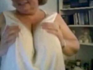 Mature Nancy playing with her boobs on webcam